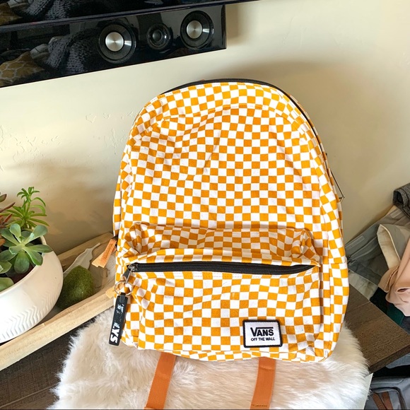 vans checkerboard backpack yellow
